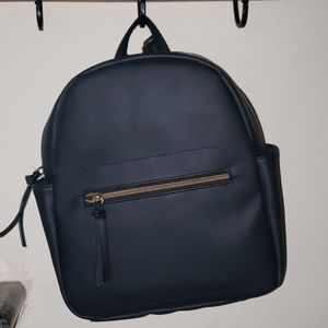 Tshirt and Jean's soda pop backpack